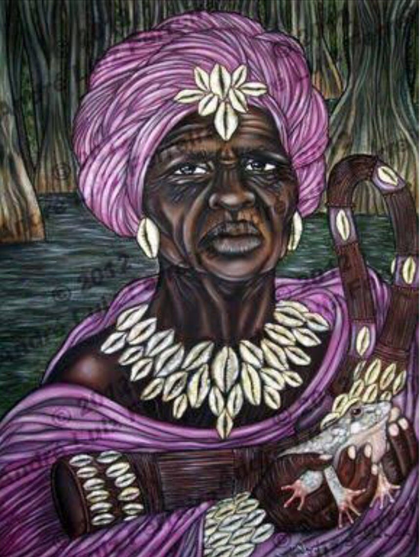 Nana Buluku with wrinkles holding a frog