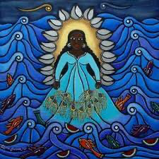 A drawing of Yemaja in the ocean with her symbols of peacock feathers, seashells, and fish.